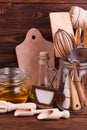 Wooden kitchen tools close-up on a brown background Royalty Free Stock Photo