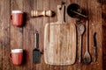 Wooden kitchen tools on dark brown table background. Royalty Free Stock Photo