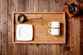 Wooden kitchen tools on dark brown table background. Royalty Free Stock Photo