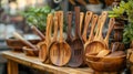 Wooden kitchen utensils on rustic table in natural light Royalty Free Stock Photo