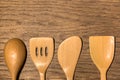 Wooden Kitchen Utensils Set in Wood Texture Background Royalty Free Stock Photo