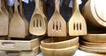 Wooden kitchen utensils on shelves in the kitchenware corner of the department store Royalty Free Stock Photo