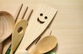 Wooden kitchenware on cutting board Royalty Free Stock Photo