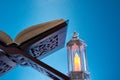 wooden koran stand with arabic lantern