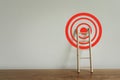 Wooden ladder with red target achievement, Business growth up and successful concept. Goal success stock market . Aiming