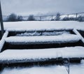 Wooden ladder with snow Royalty Free Stock Photo