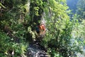 Wooden ladder with trekkers in Canyon Prielom Hornadu in SlovenskÃÂ½ raj Slovak Paradise National Park