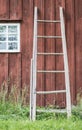 Wooden ladder and wall of old farmhouse Royalty Free Stock Photo