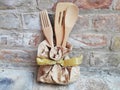 Wooden ladles inside paper container