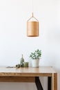 Wooden lamp over the table