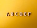 Wooden letter toy arranged the word ABCDEF