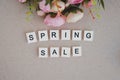 wooden lettering spring sale and flowers