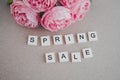 wooden lettering spring sale and peonies