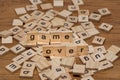 Wooden letters composing the words `game over` Royalty Free Stock Photo