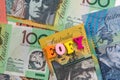 Wooden letters `EOFY` on australian dollars background Royalty Free Stock Photo