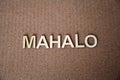 Wooden letters forming the words Mahalo in Hawaiian Royalty Free Stock Photo