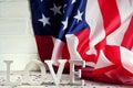 Wooden letters are laid out in the word love, July 4, happy independence day, patriotism, memory of veterans, the concept