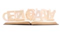 Wooden letters over the book's surface Royalty Free Stock Photo