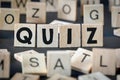 Wooden letters spelling quiz