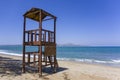 Wooden lifeguard tower on empty beach Royalty Free Stock Photo