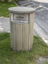 The wooden litter bin