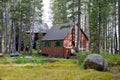 Wooden lodges in forest