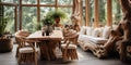 Wooden log dining table and armchairs near it. Organic interior design of modern living room in country house