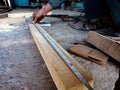 wooden logs measurements at workshop in India Royalty Free Stock Photo