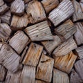 Wooden logs stacked in a pile for firewood, Wood background