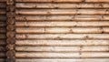 Wooden logs wall and ends of logs Royalty Free Stock Photo