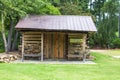 A wooden long cabin at Historic Yates Mill County Park