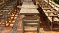 Wooden long table, chairs, red tiles, nature, traditional style