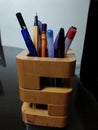 Wooden look pen stand design