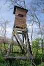 Wooden lookout tower for hunting in the woods Royalty Free Stock Photo