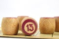 Wooden lotto barrels with numbers. Isolated on a white background. Family bingo game. Conceptual photo