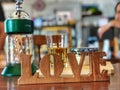 Wooden love word shape With cafe background Royalty Free Stock Photo