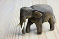 Wooden male elephant on wooden table Royalty Free Stock Photo