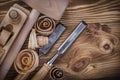 Wooden mallet shaving plane flat chisels curled shavings on vint Royalty Free Stock Photo