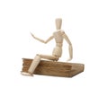 Wooden man and book Royalty Free Stock Photo