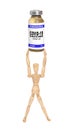 Wooden man figure with a coronavirus vaccine - getting a COVID-19 vaccine concept
