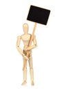 Wooden Manikin holds blank blackboard on white background