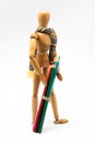 Wooden mannequin with colorful paints, back to school