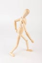 Wooden mannequin figure expressing back pain Royalty Free Stock Photo