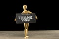 Wooden mannequin holding a thank you sign Royalty Free Stock Photo
