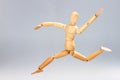 Wooden mannequin jumping Royalty Free Stock Photo