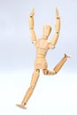Wooden mannequin jumping Royalty Free Stock Photo