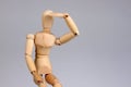 Wooden mannequin looking Royalty Free Stock Photo