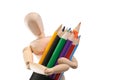 Wooden mannequin and set of color pencils