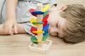 Wooden marble race tower. Children toy for happy fun play. Royalty Free Stock Photo