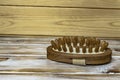 Wooden massage anti-cellulite brush on a wooden background Royalty Free Stock Photo